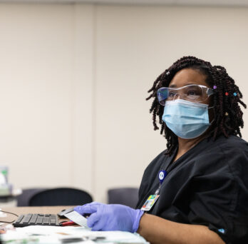 Nurse takes patient's information 
